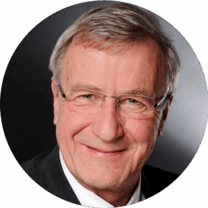 Smiling older man wearing glasses headshot