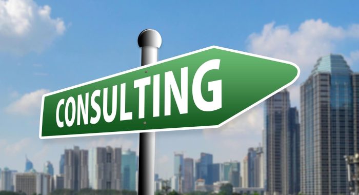 Green consulting sign with city skyline